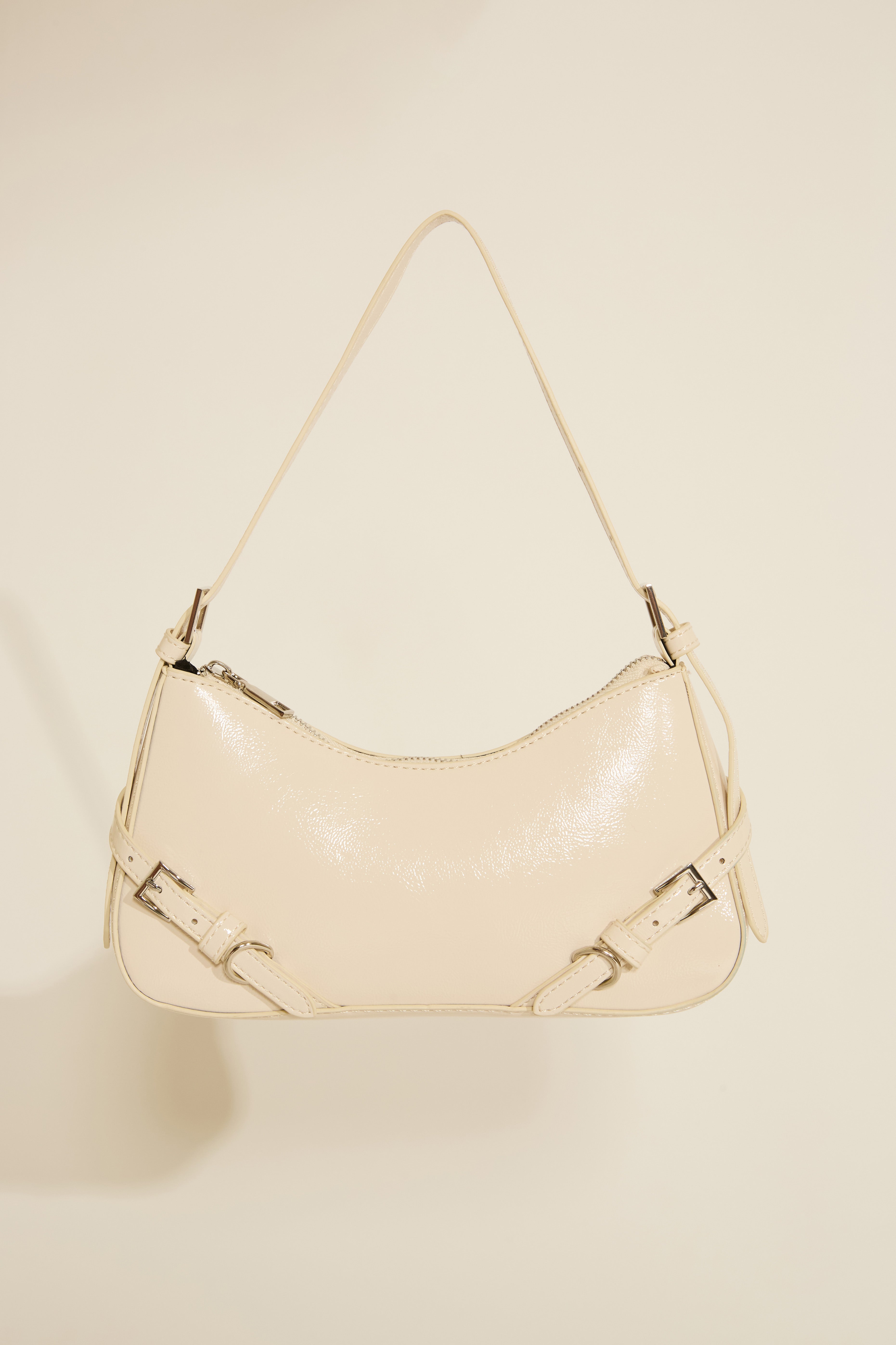 VEGAN LEATHER SHOULDER BAG WITH STRAP DETAILS
