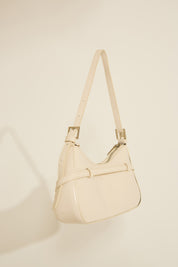 VEGAN LEATHER SHOULDER BAG WITH STRAP DETAILS