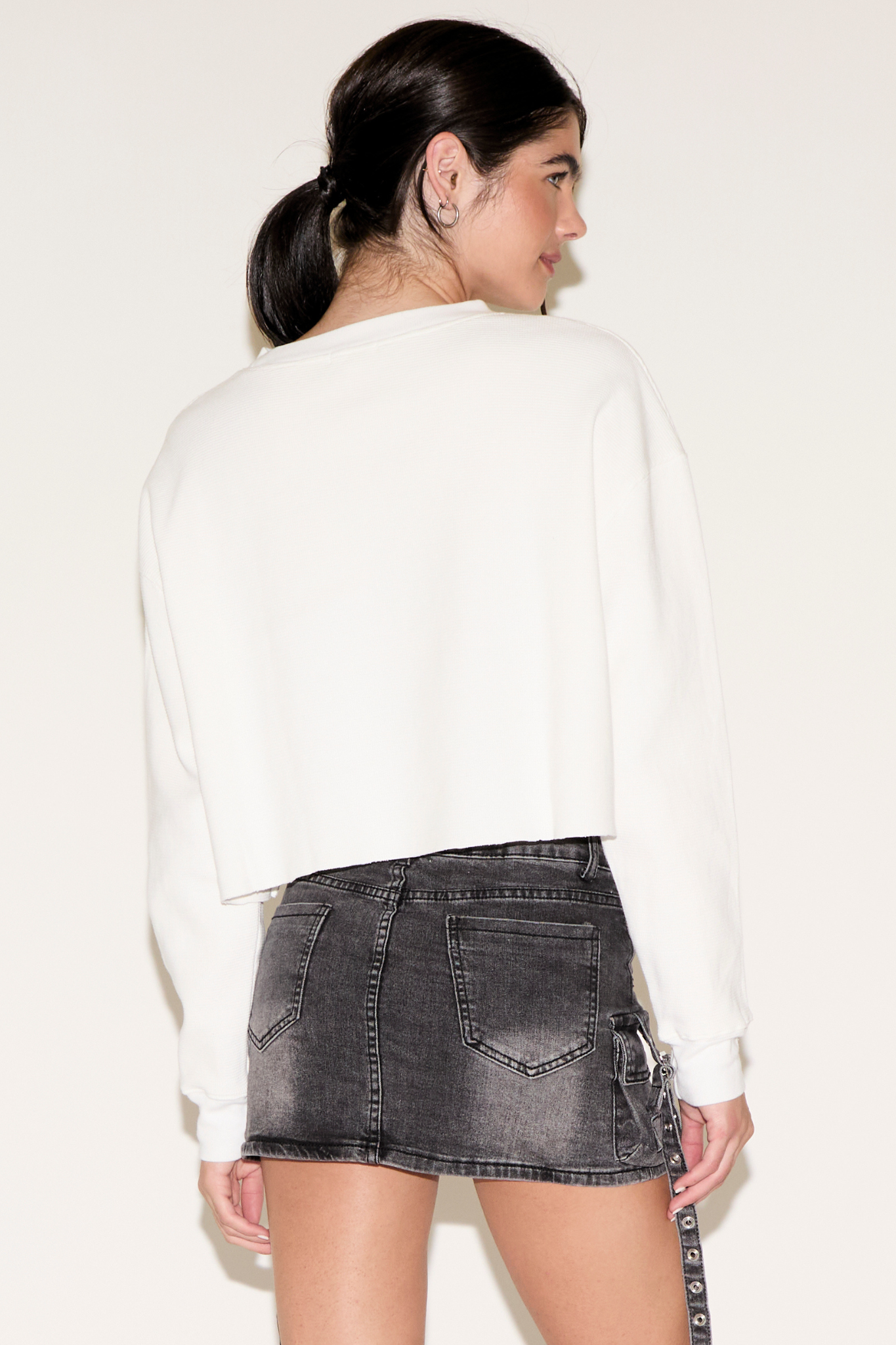 CONTRAST NUMBER 84 LONG SLEEVE CROPPED TOP