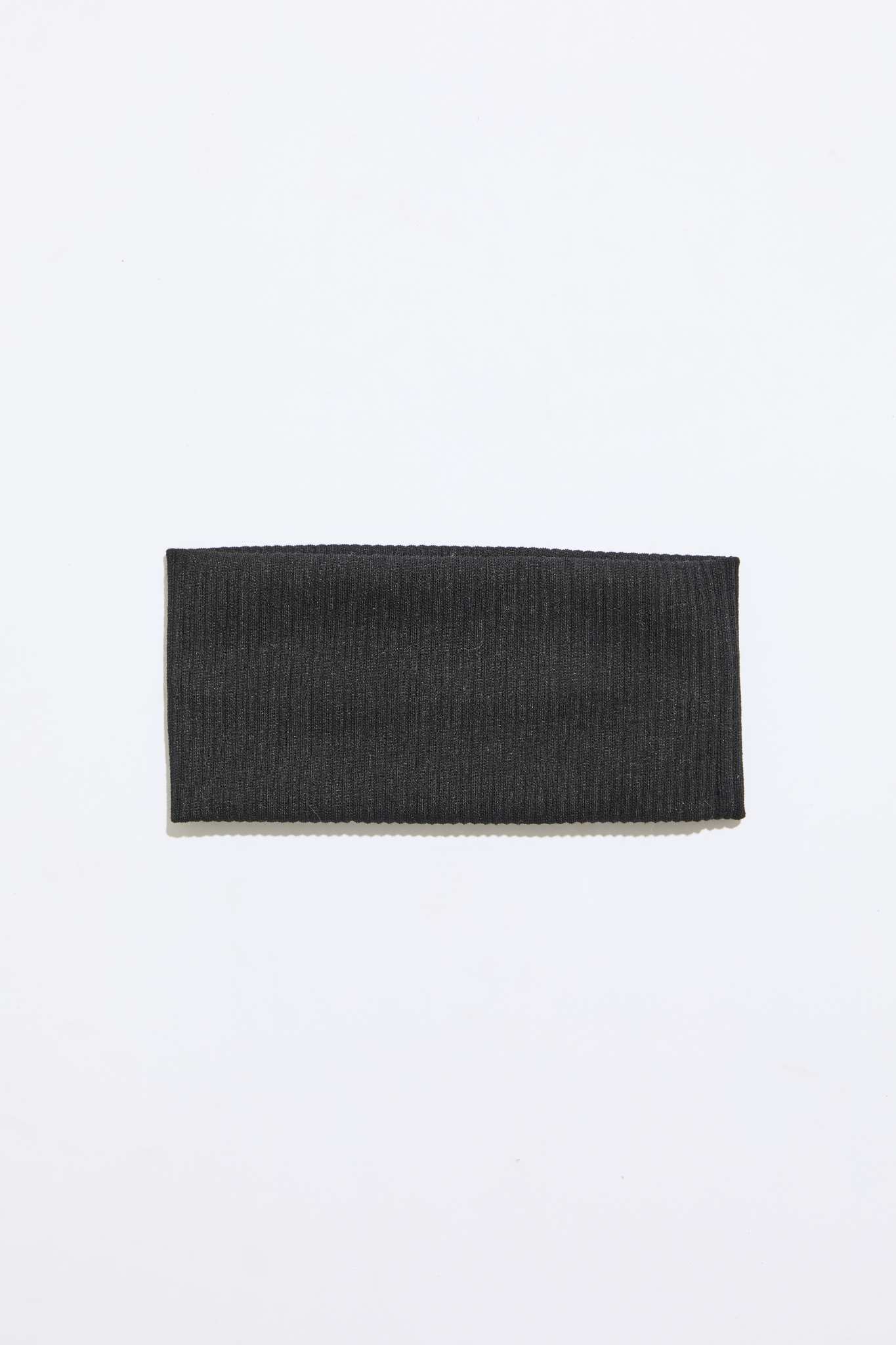 Black headband on a white background