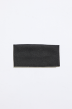 Black headband on a white background