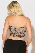 Model is wearing a ash camo tube top with a black skirt on a white background.