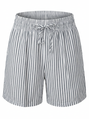 Ghost cut mannequin wearing STRIPE SEERSUCKER ELASTIC WAIST SHORT WITH POCKETS on  a white background. 