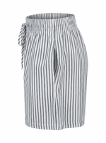 Ghost cut mannequin wearing STRIPE SEERSUCKER ELASTIC WAIST SHORT WITH POCKETS on  a white background. 