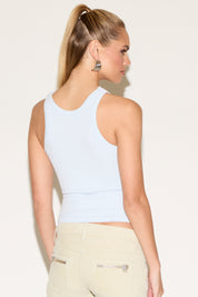 Model wearing a blue tank top.