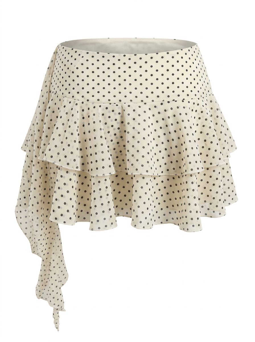 Ghost mannequin photo of a cream POLKA DOT TIERED RUFFLE SKORT on a white background. 