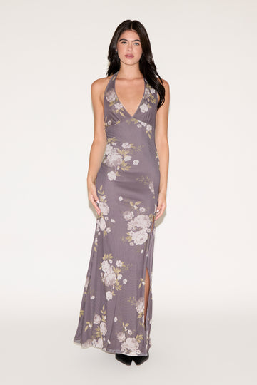 Woman wearing a floral dress on a white background