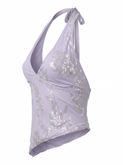 Ghost mannequin product image of a lavender Sequin Embroidery Asymmetric Hem Tie Neck Top displayed on a clean white background.