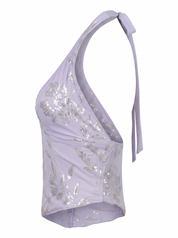 Ghost mannequin product image of a lavender Sequin Embroidery Asymmetric Hem Tie Neck Top displayed on a clean white background.