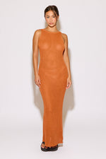 Woman wearing an orange dress on a white background