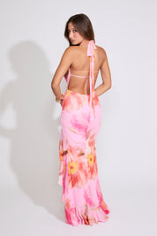 Model is wearing a pink FLORAL TIE COWL NECK MAXI DRESS WITH RUFFLE SLIT on a white background.