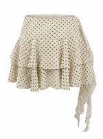Ghost mannequin photo of a cream POLKA DOT TIERED RUFFLE SKORT on a white background. 