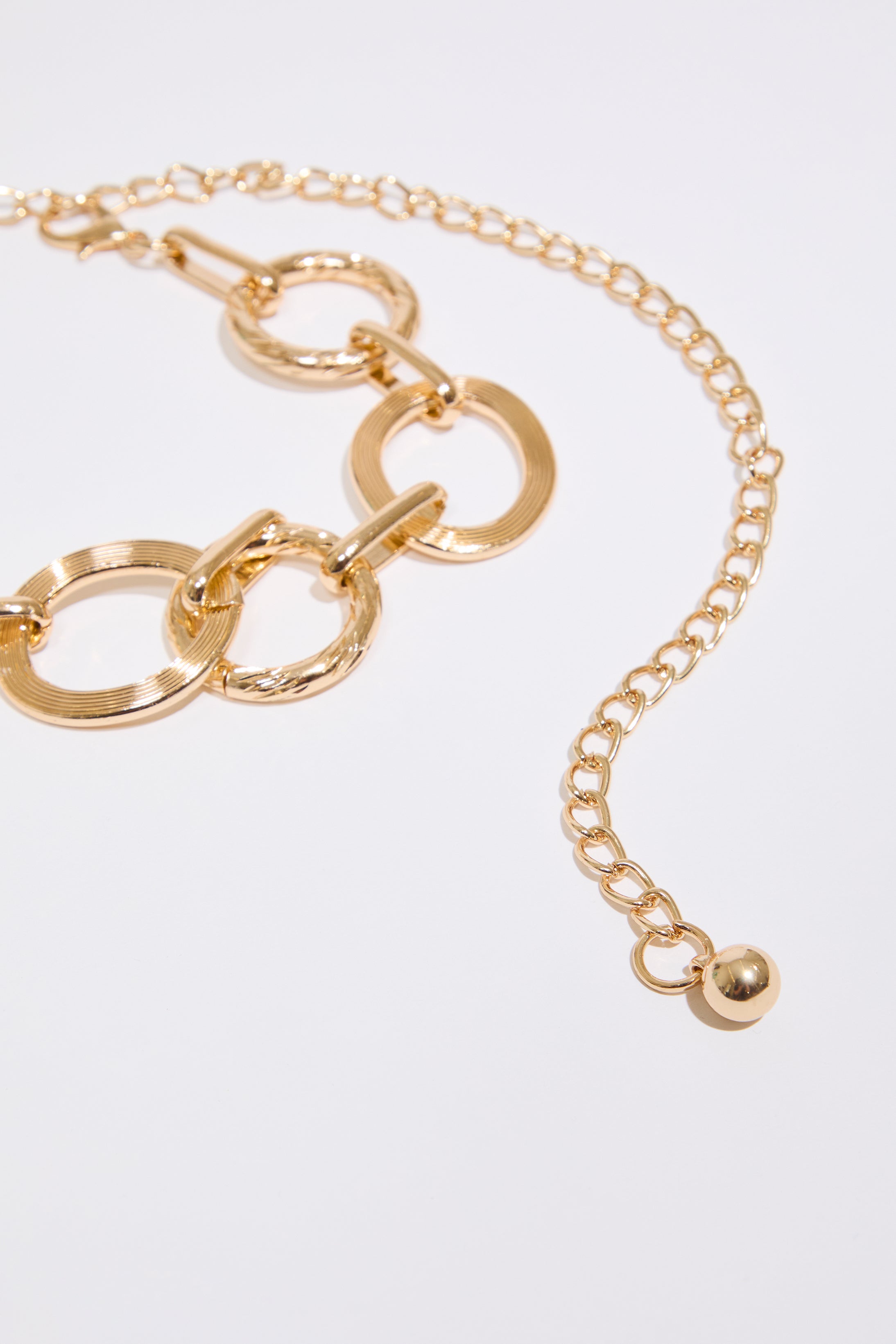 Gold METAL OVAL LINK CHAIN BELT  on a white background.