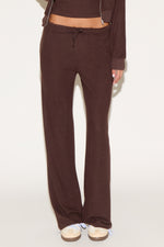 girl wearing brown pants