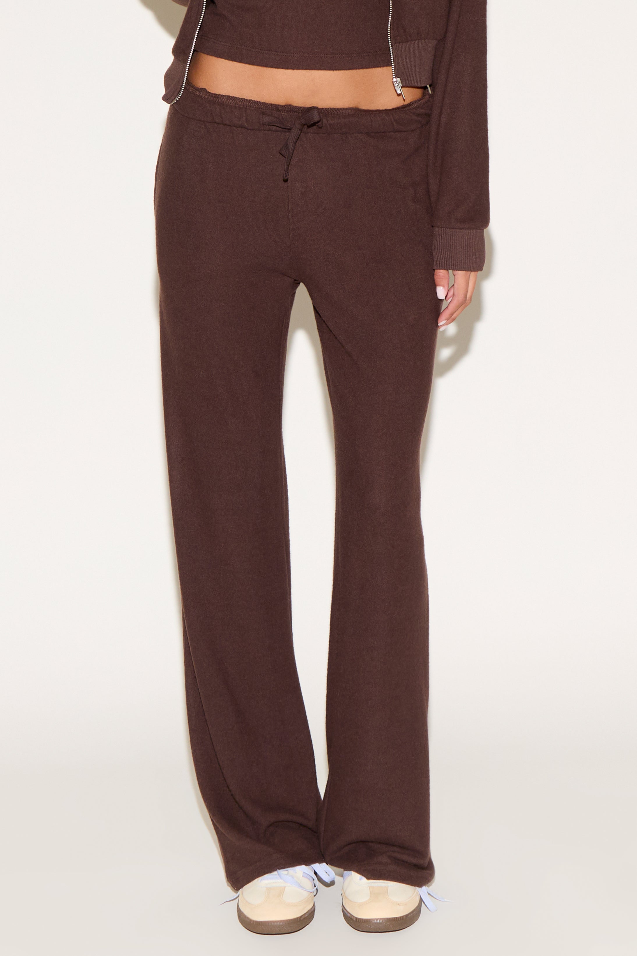 girl wearing brown pants