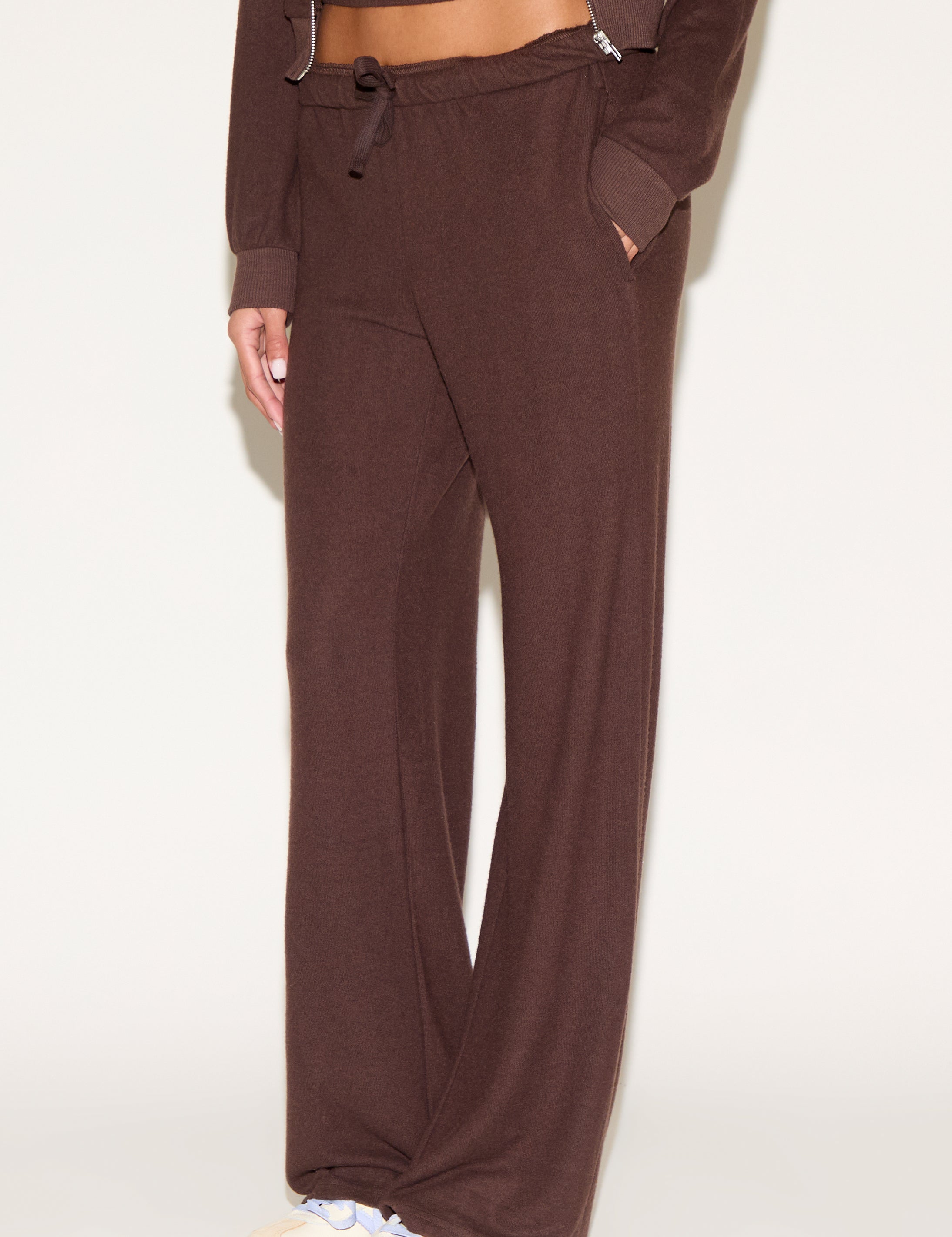 girl wearing brown pants