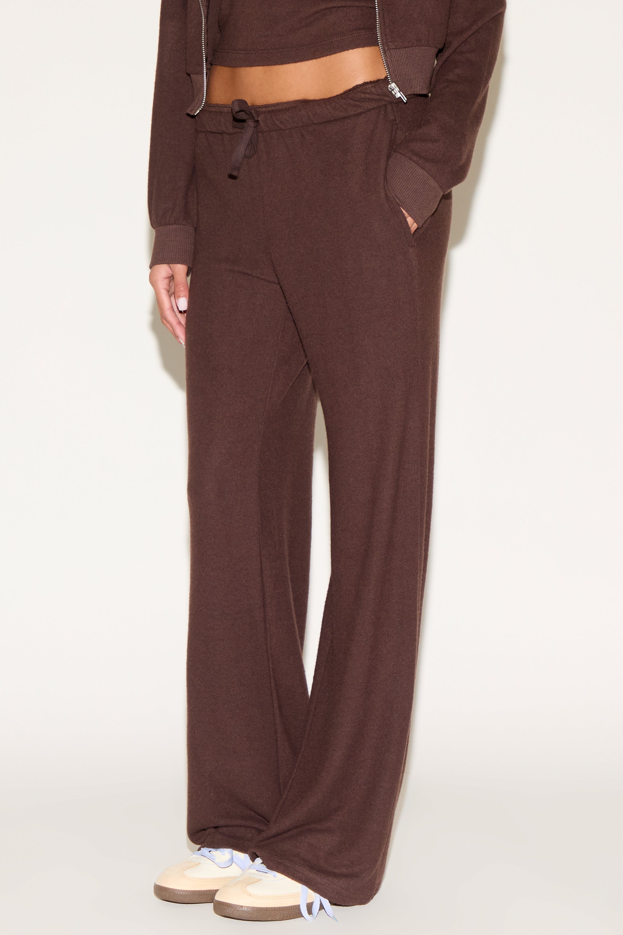 girl wearing brown pants