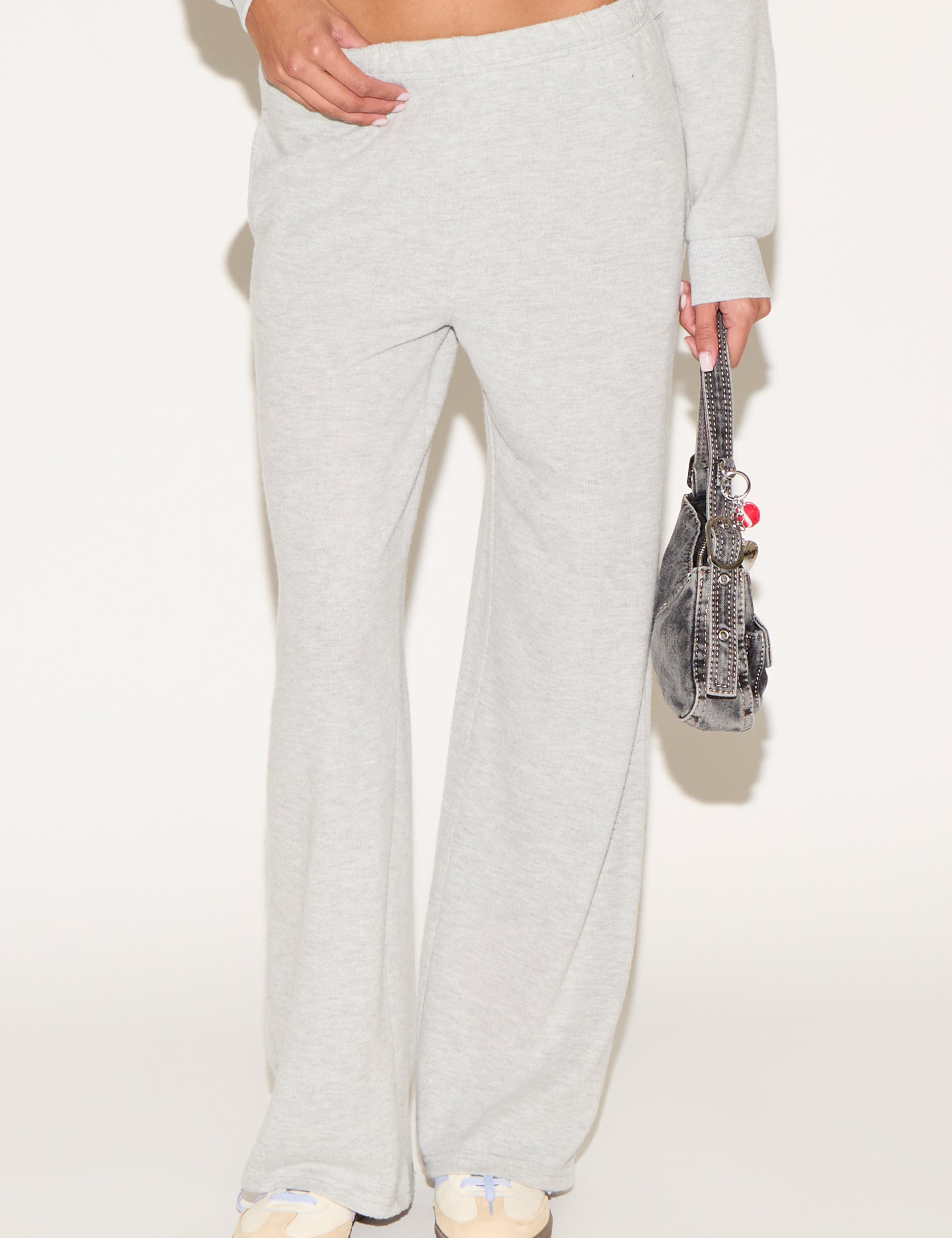 girl wearing grey pants