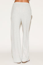 girl wearing grey pants