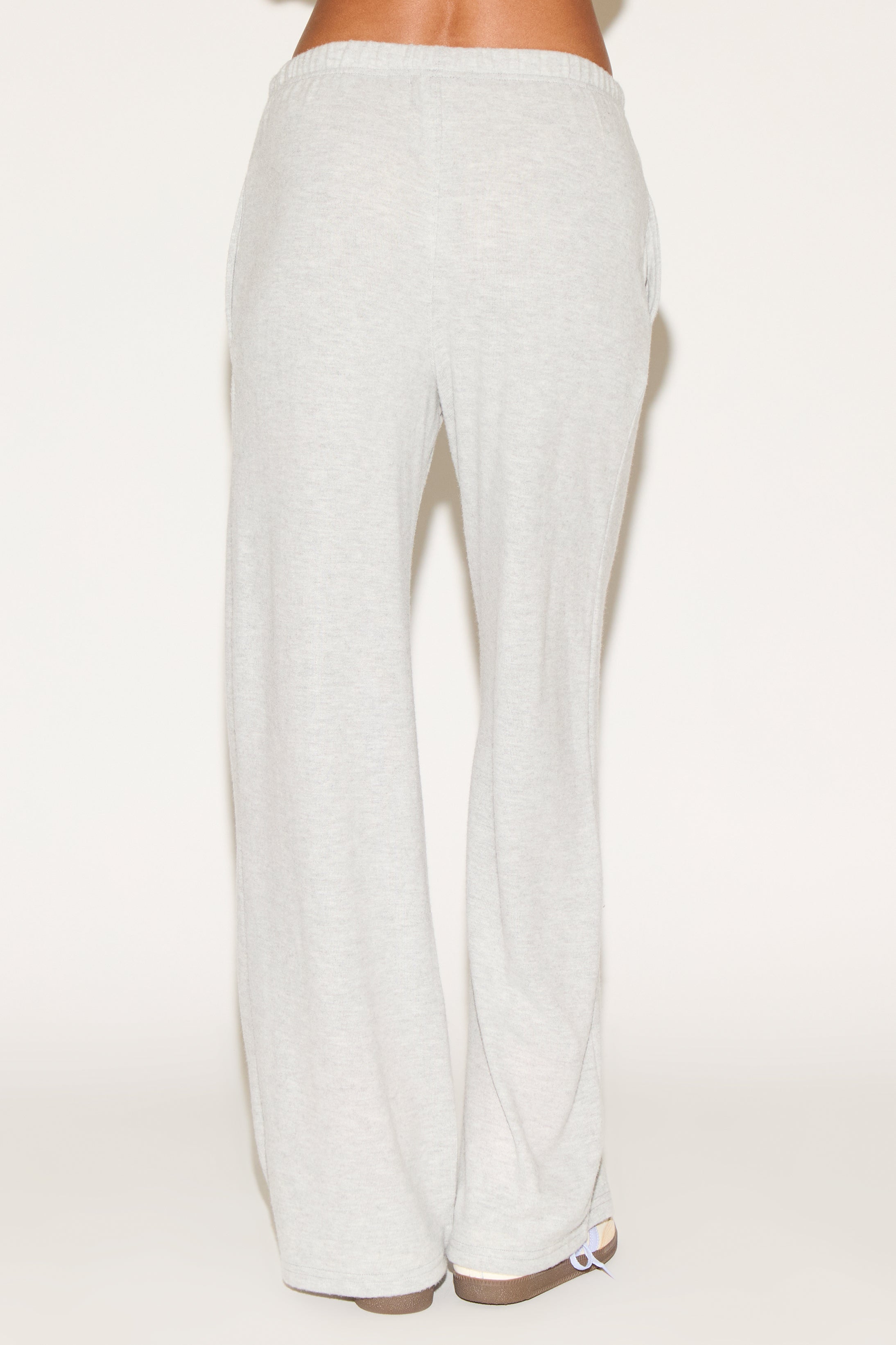 girl wearing grey pants