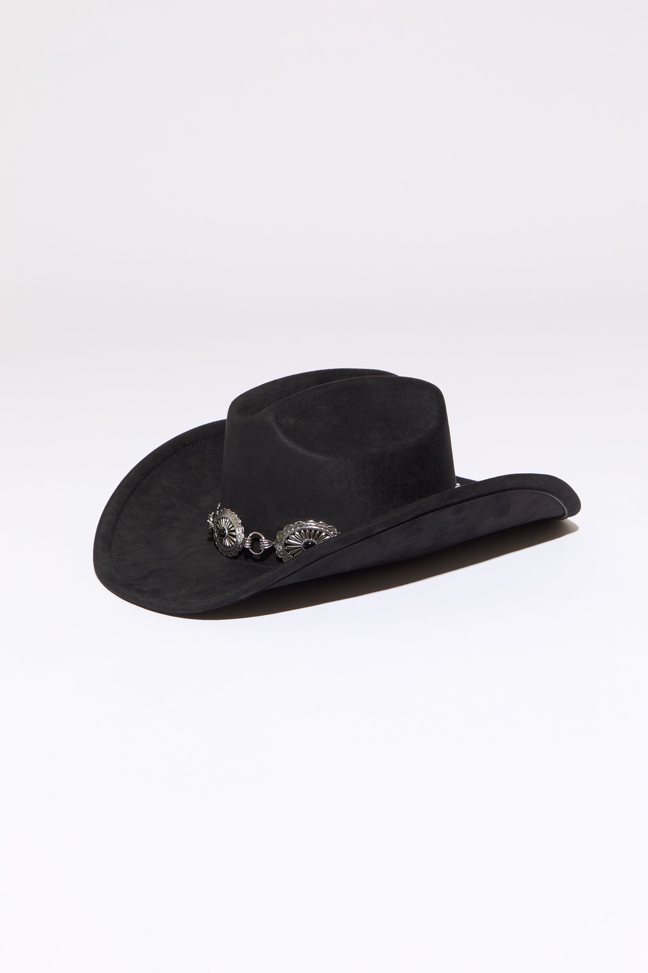 Black cowboy hat with stone accent concho beaded silver  chain on a white background. 