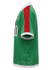 Ghost cut image of a green Mexico jersey on a white background.