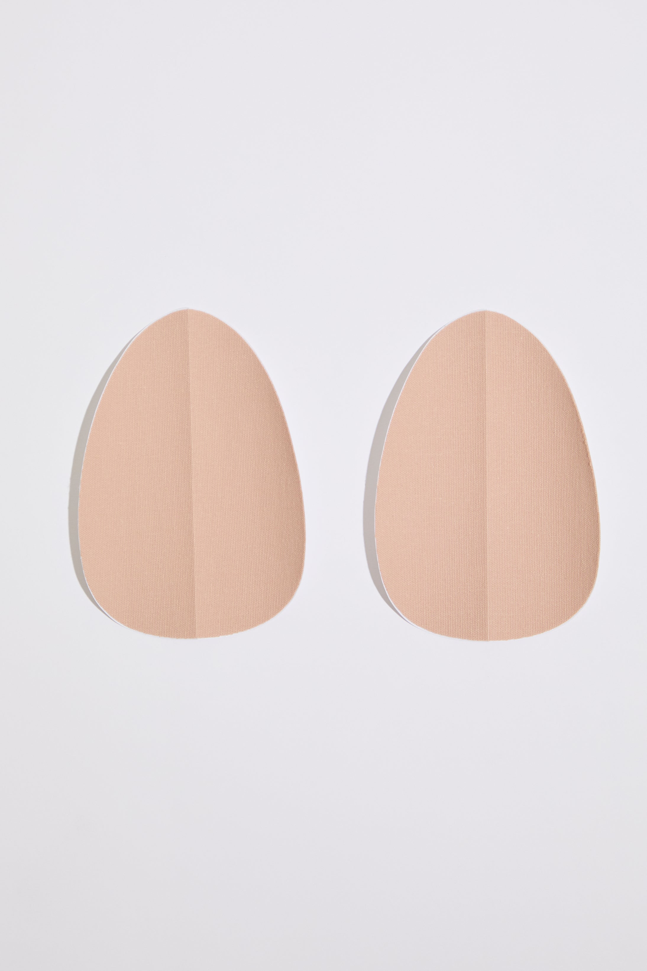 ROUND ADHESIVE LIFTING PASTIES on a white background.