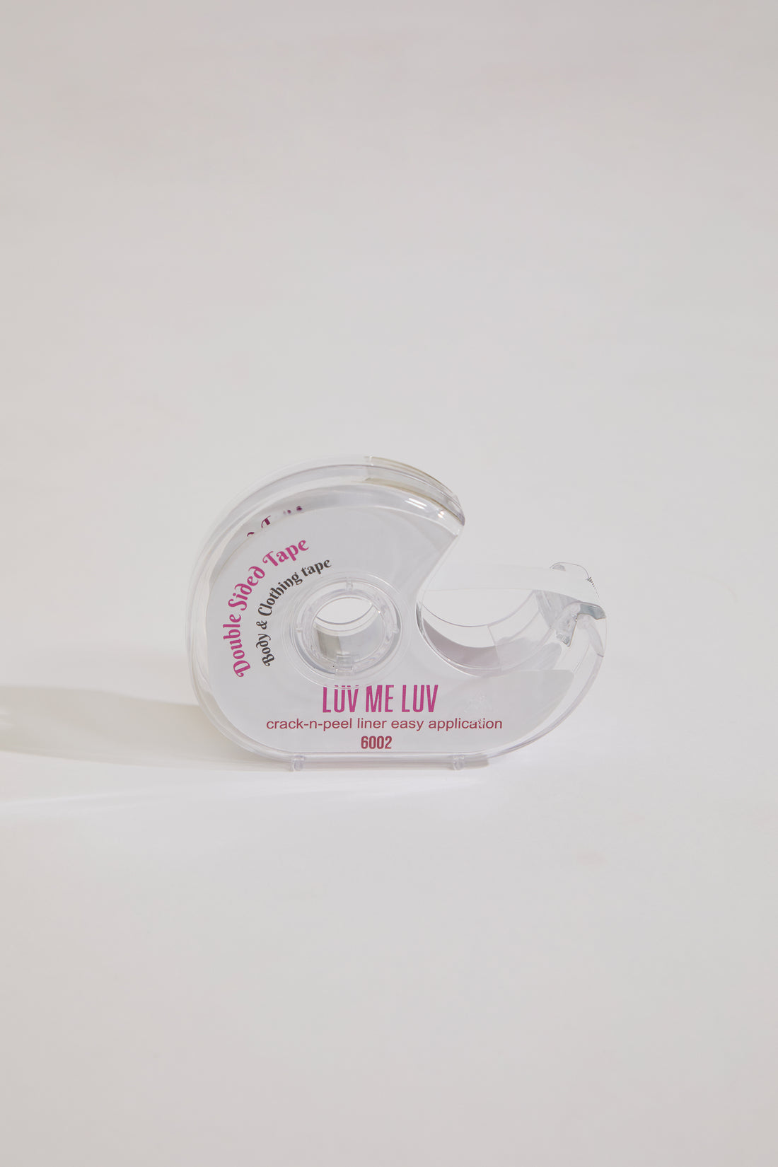 Clear plastic packaging with text on a white background