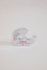 Clear plastic packaging with text on a white background