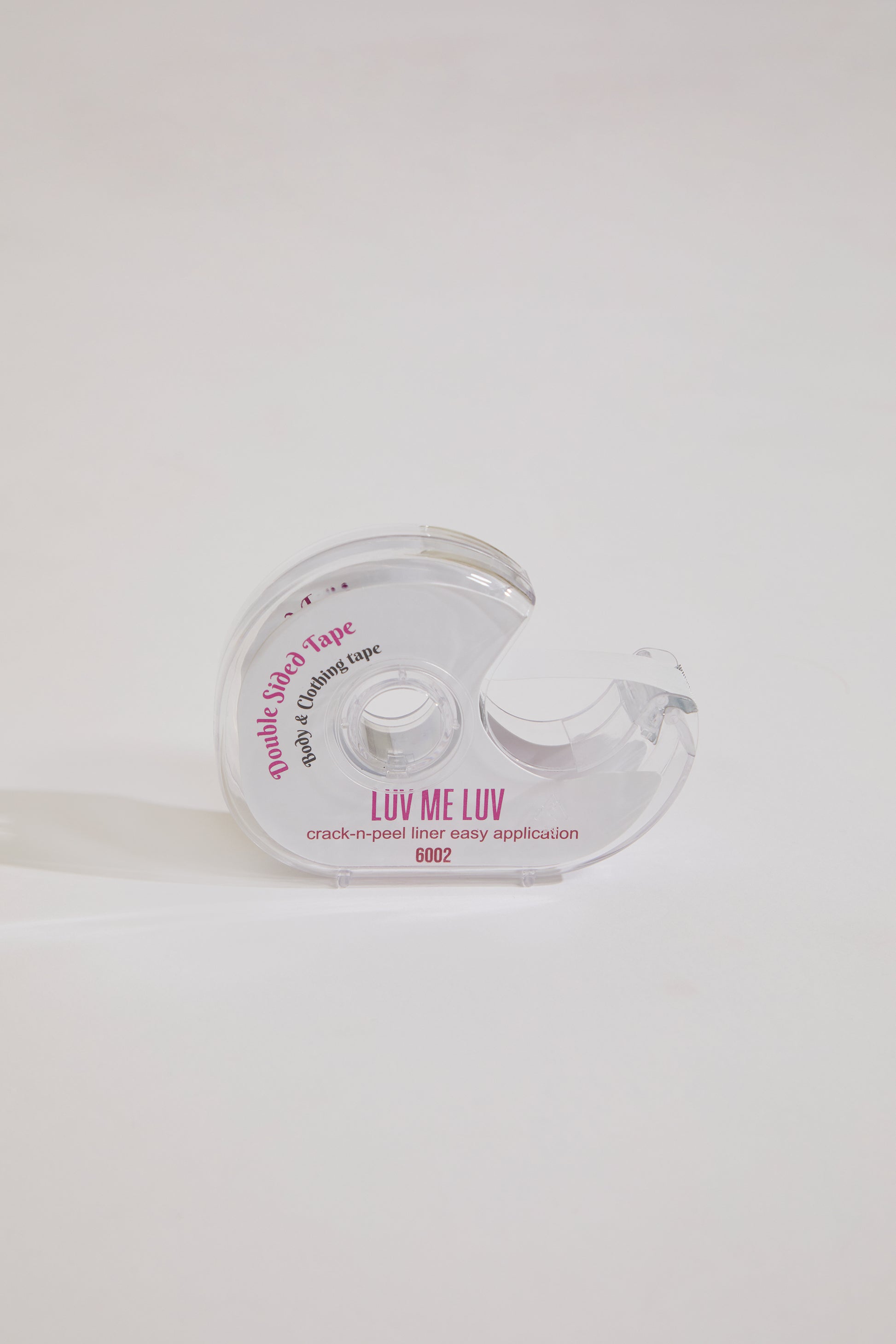 Clear plastic packaging with text on a white background