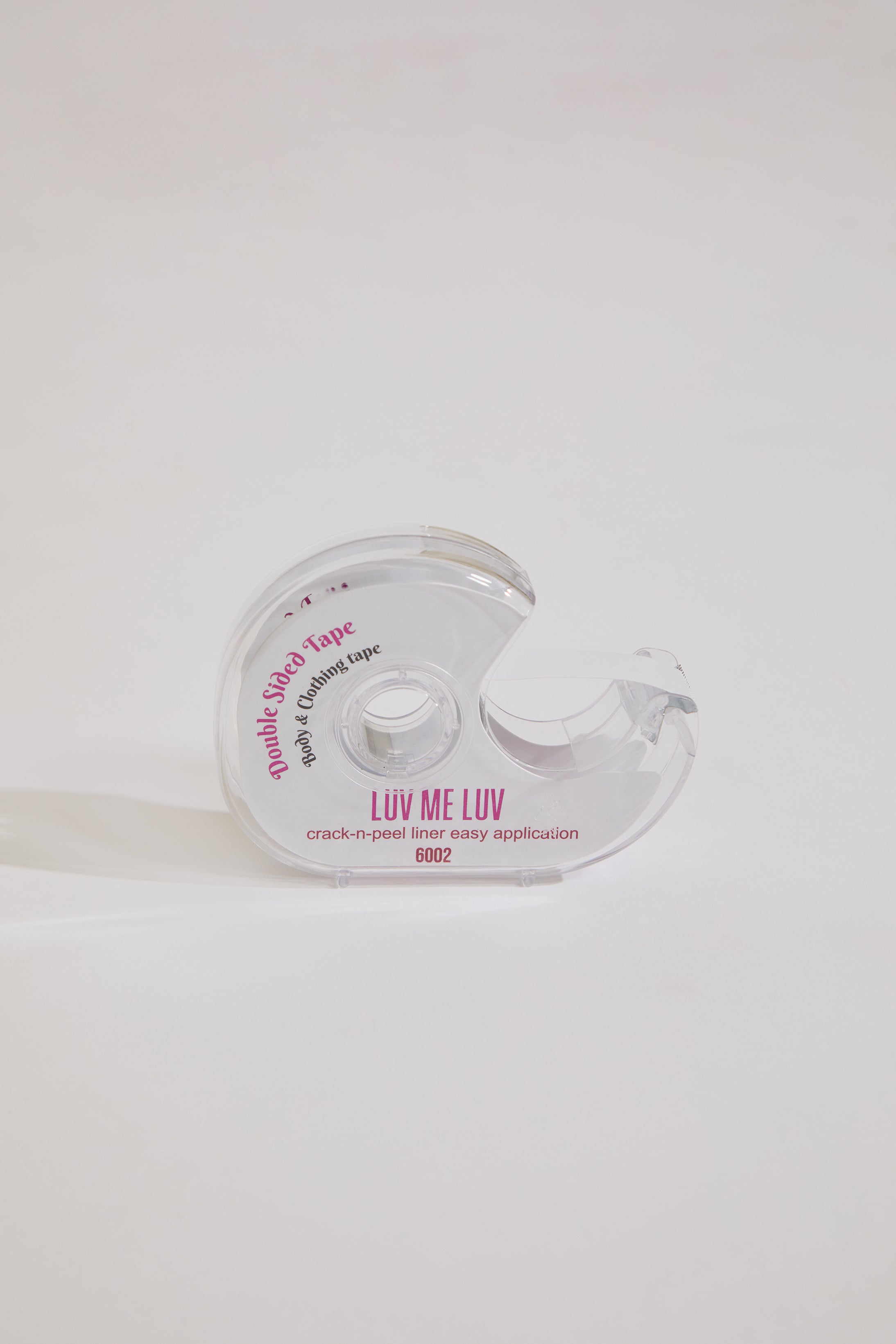 Clear plastic packaging with text on a white background