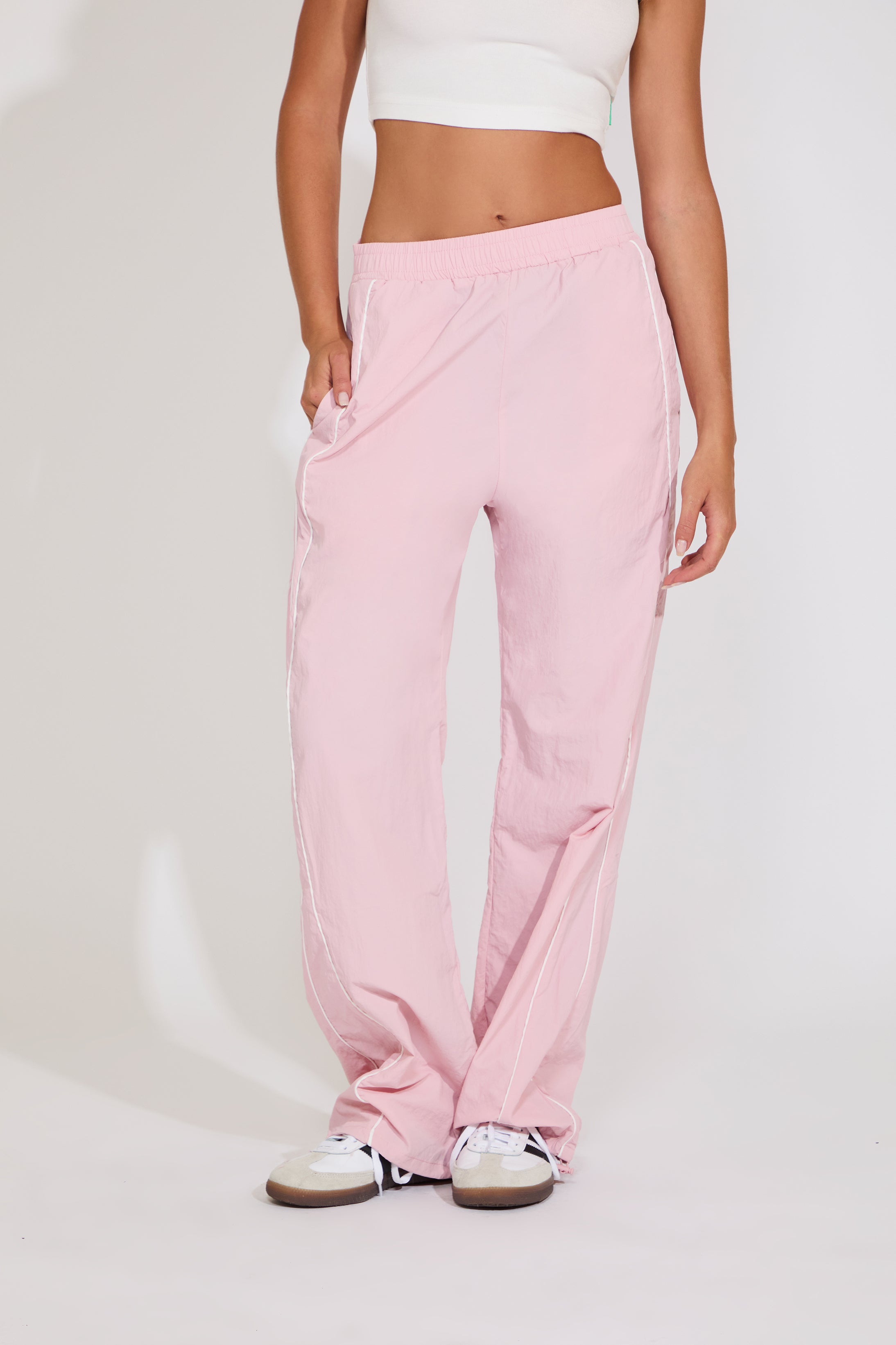 SIDE PIPING TRACKSUIT PANTS WITH LEG OPENING STOPPER