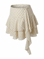 Ghost mannequin photo of a cream POLKA DOT TIERED RUFFLE SKORT on a white background. 