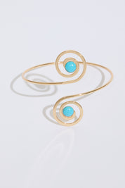 SWIRLS WITH JEWELS METAL ARM CUFF on a white background.