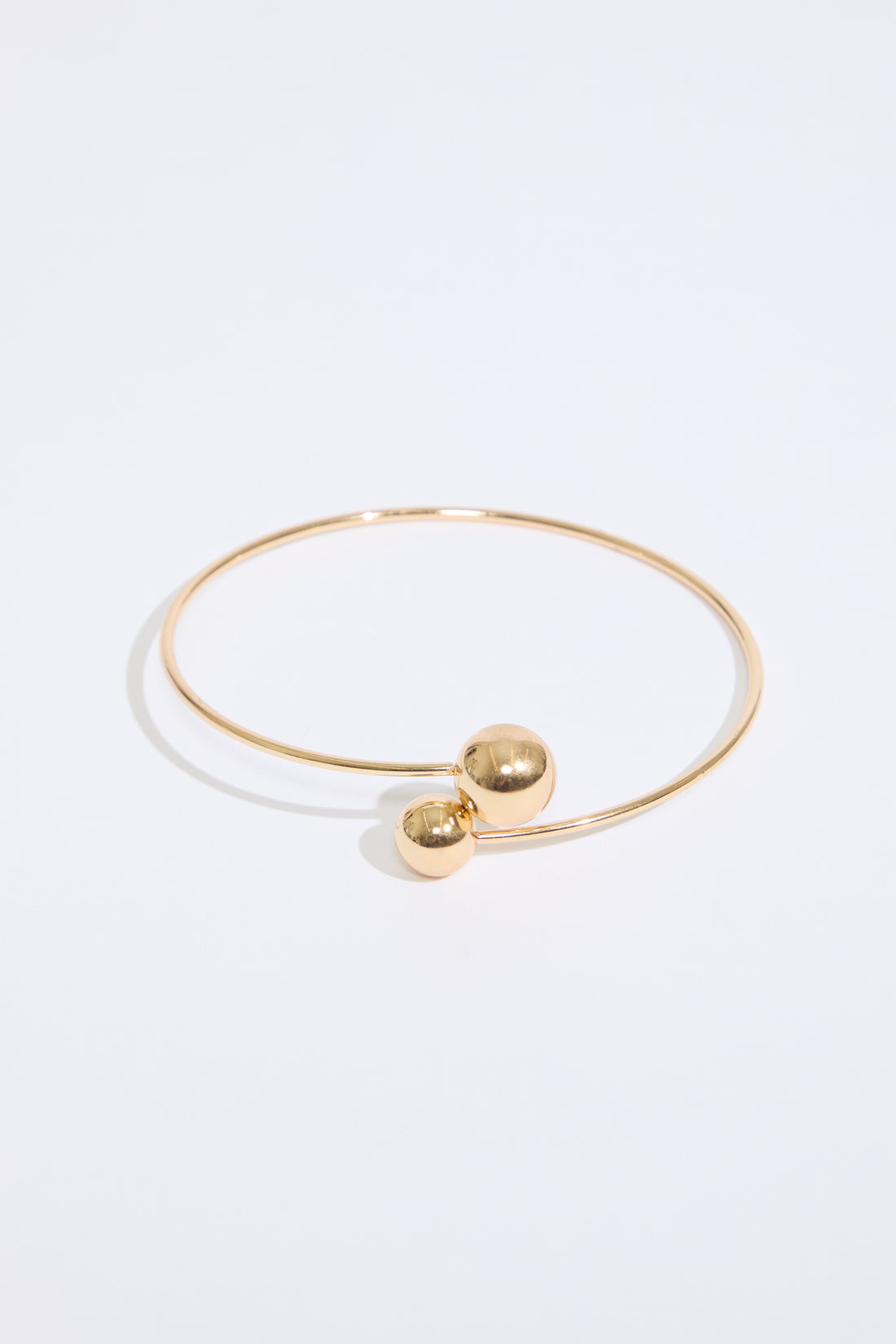 GOLD SIMPLE BALL DESIGN METAL ARM CUFF on a white background.