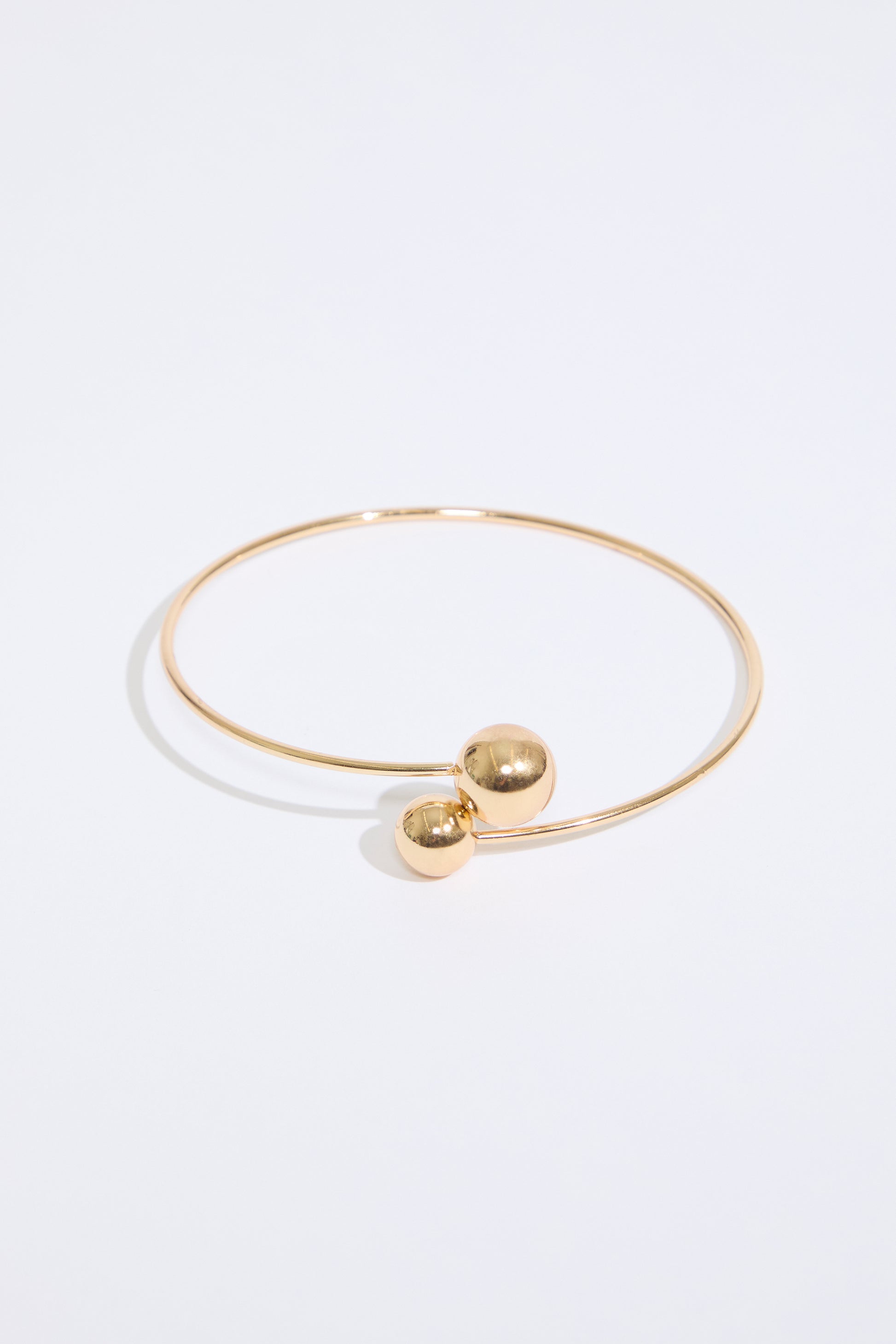 GOLD SIMPLE BALL DESIGN METAL ARM CUFF on a white background.