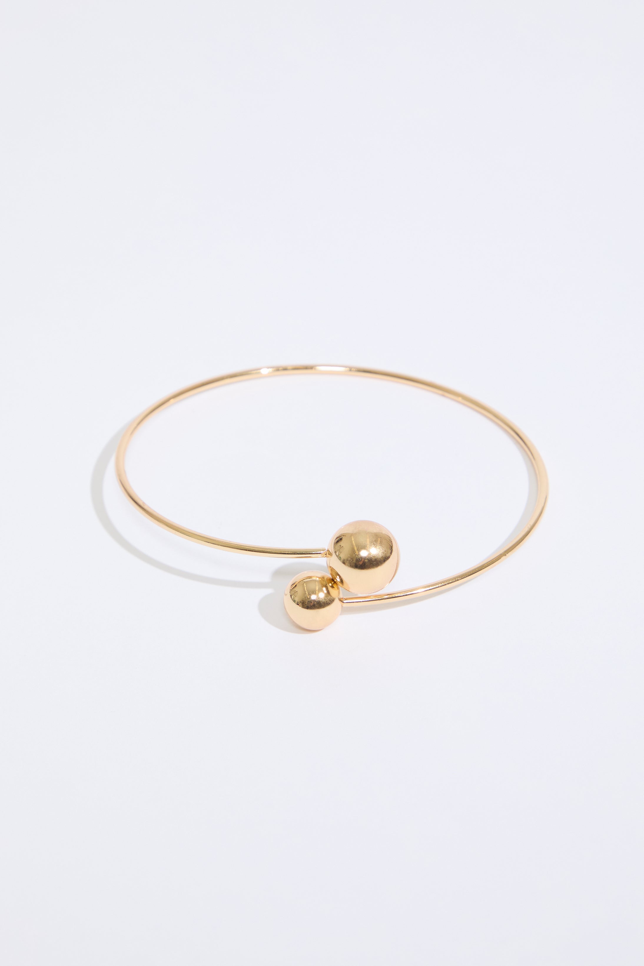 GOLD SIMPLE BALL DESIGN METAL ARM CUFF on a white background.