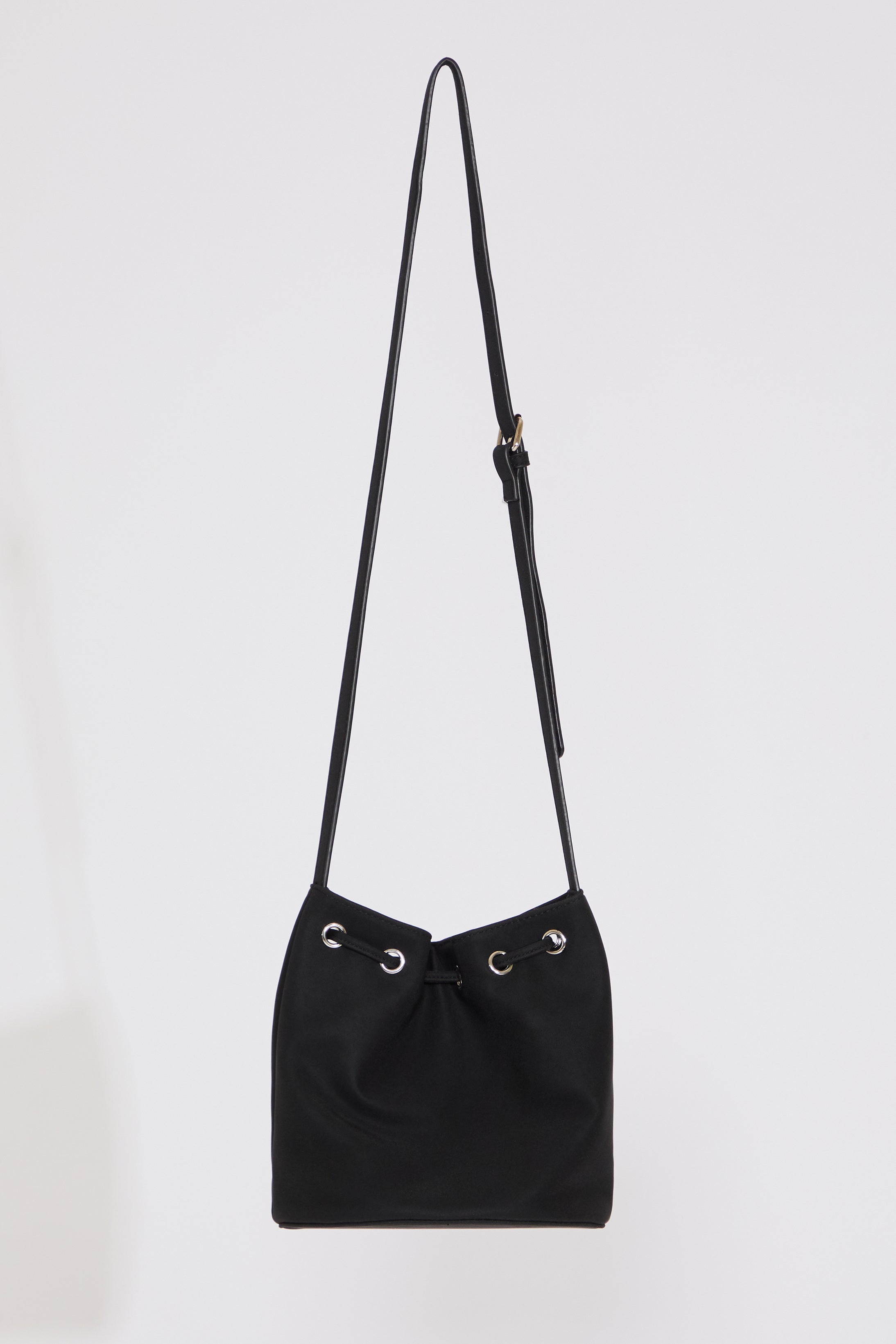 GROMMET DTL CROSSBODY VEGAN LEATHER BUCKET BAG