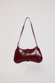 VEGAN LEATHER BENT HOBO BAG W STUDS & BUCKLES