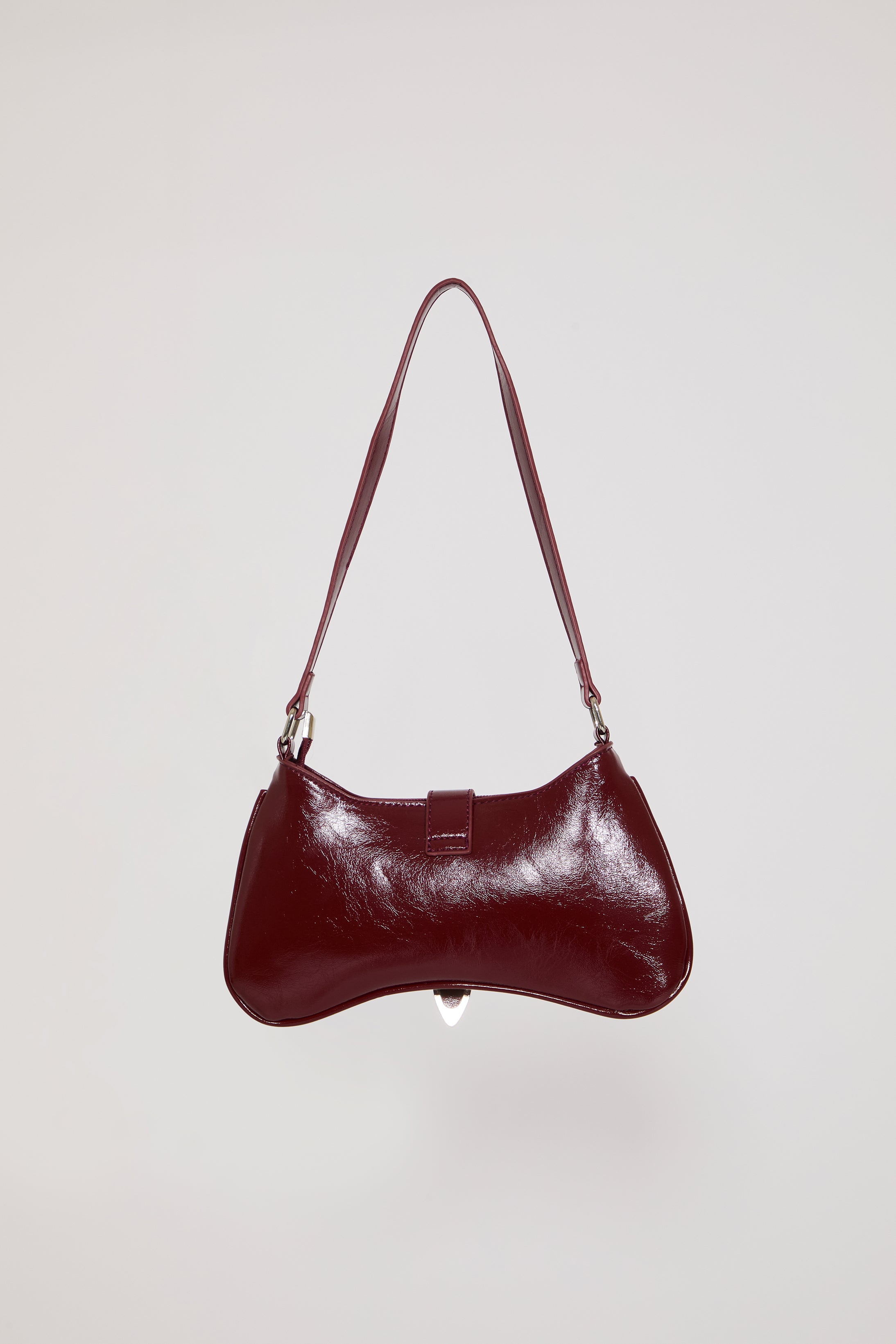 VEGAN LEATHER BENT HOBO BAG W STUDS & BUCKLES