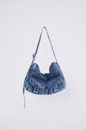 Denim handbag on a light gray background