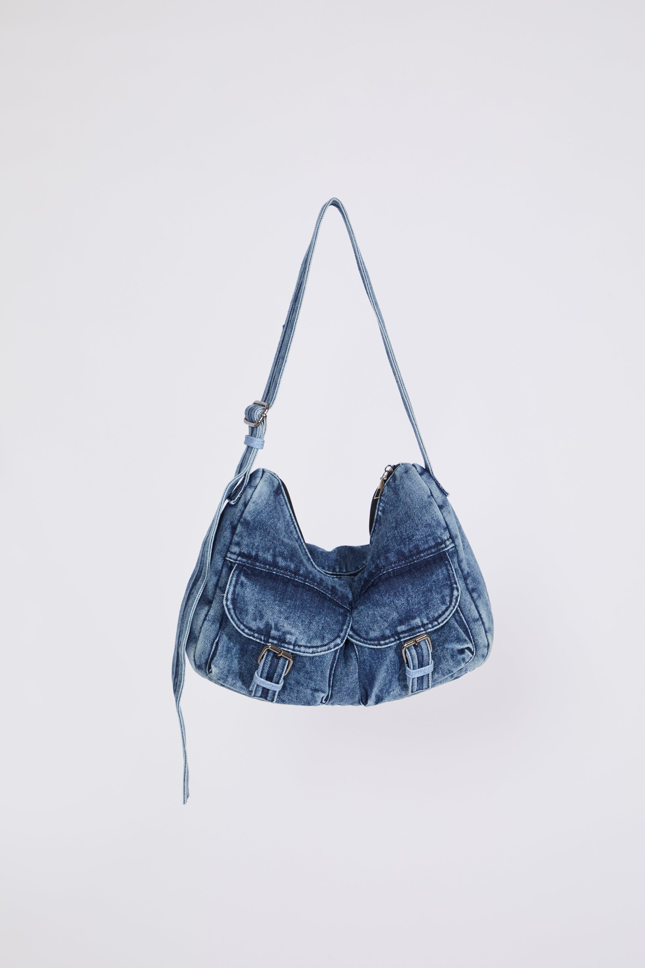 Denim handbag on a light gray background