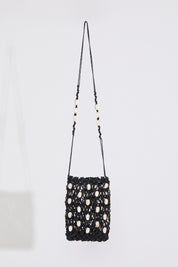 Black SHELL EMBELLISHED WOVEN DRAWSTRING BAG on a white background.