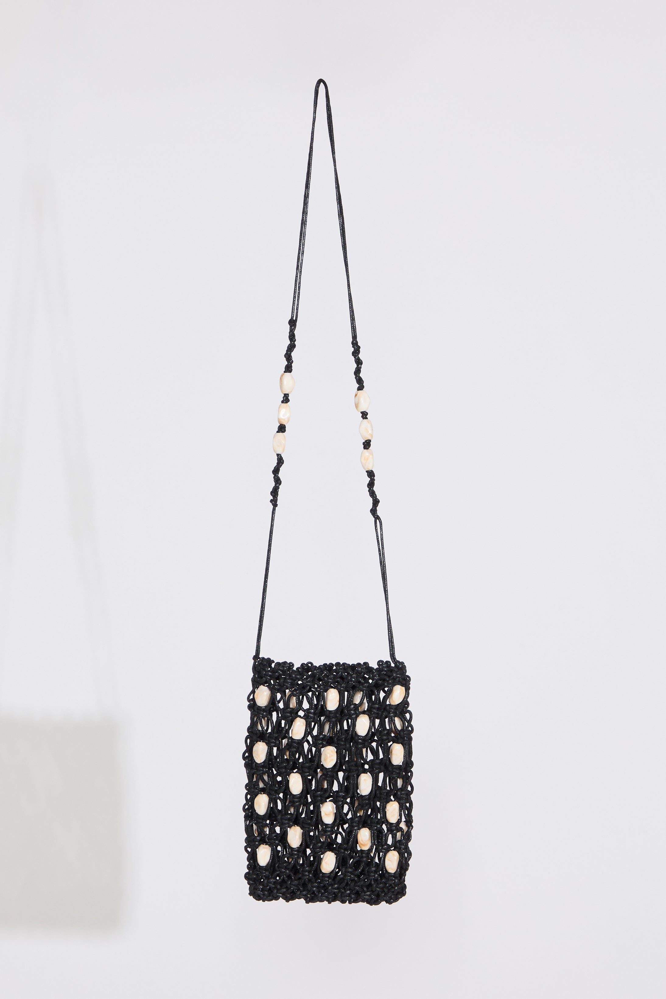 Black SHELL EMBELLISHED WOVEN DRAWSTRING BAG on a white background.