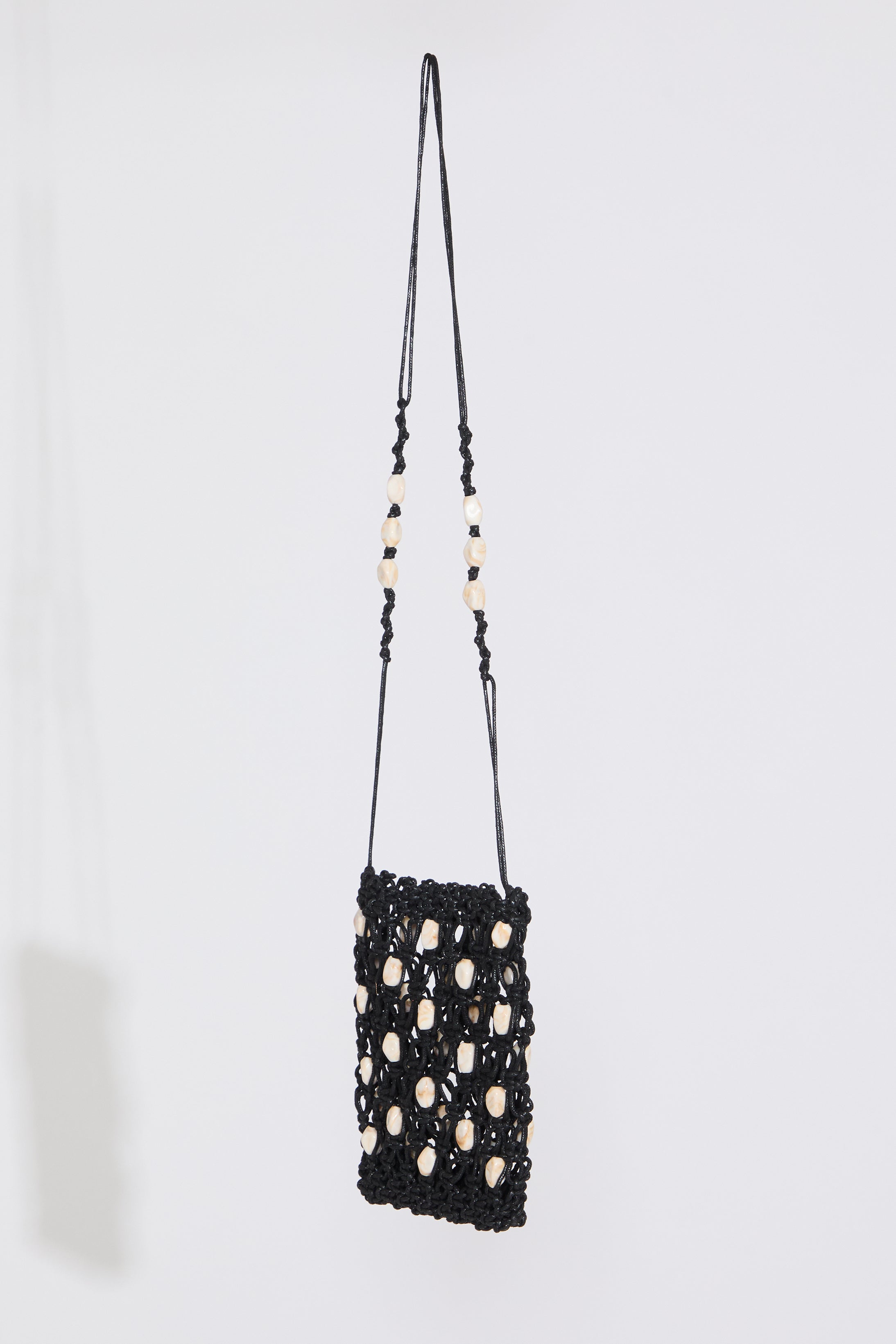 Black SHELL EMBELLISHED WOVEN DRAWSTRING BAG on a white background.