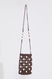 SHELL EMBELLISHED WOVEN DRAWSTRING BAG on a white background.