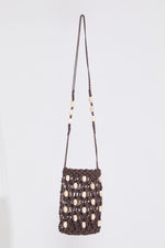 SHELL EMBELLISHED WOVEN DRAWSTRING BAG on a white background.