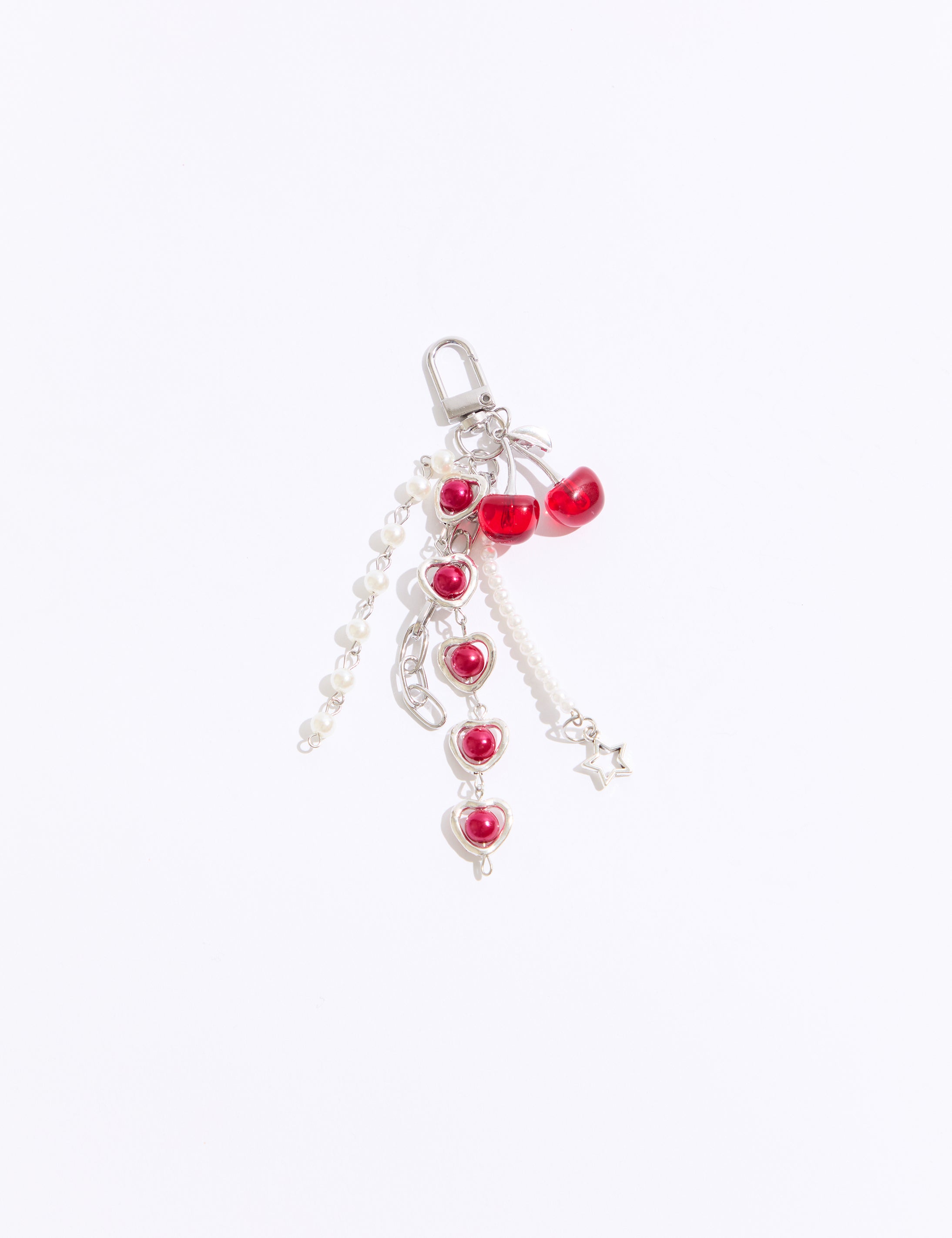 Keychain with red heart-shaped beads on a white background