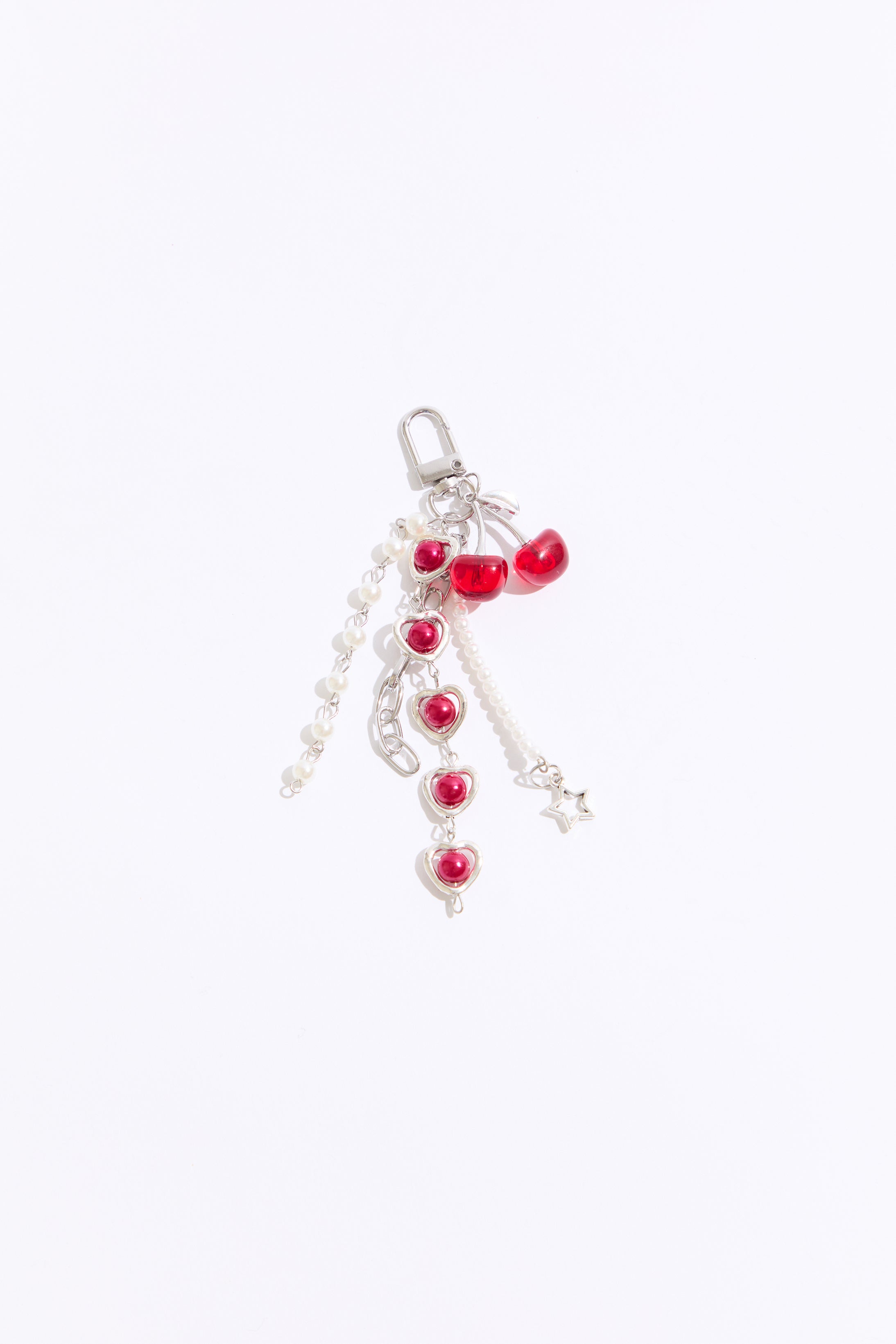 Keychain with red heart-shaped beads on a white background