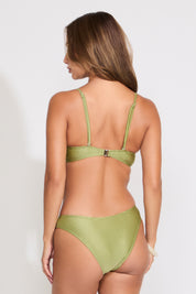 Model is wearing a green stone detail textured bikini set on a white background.